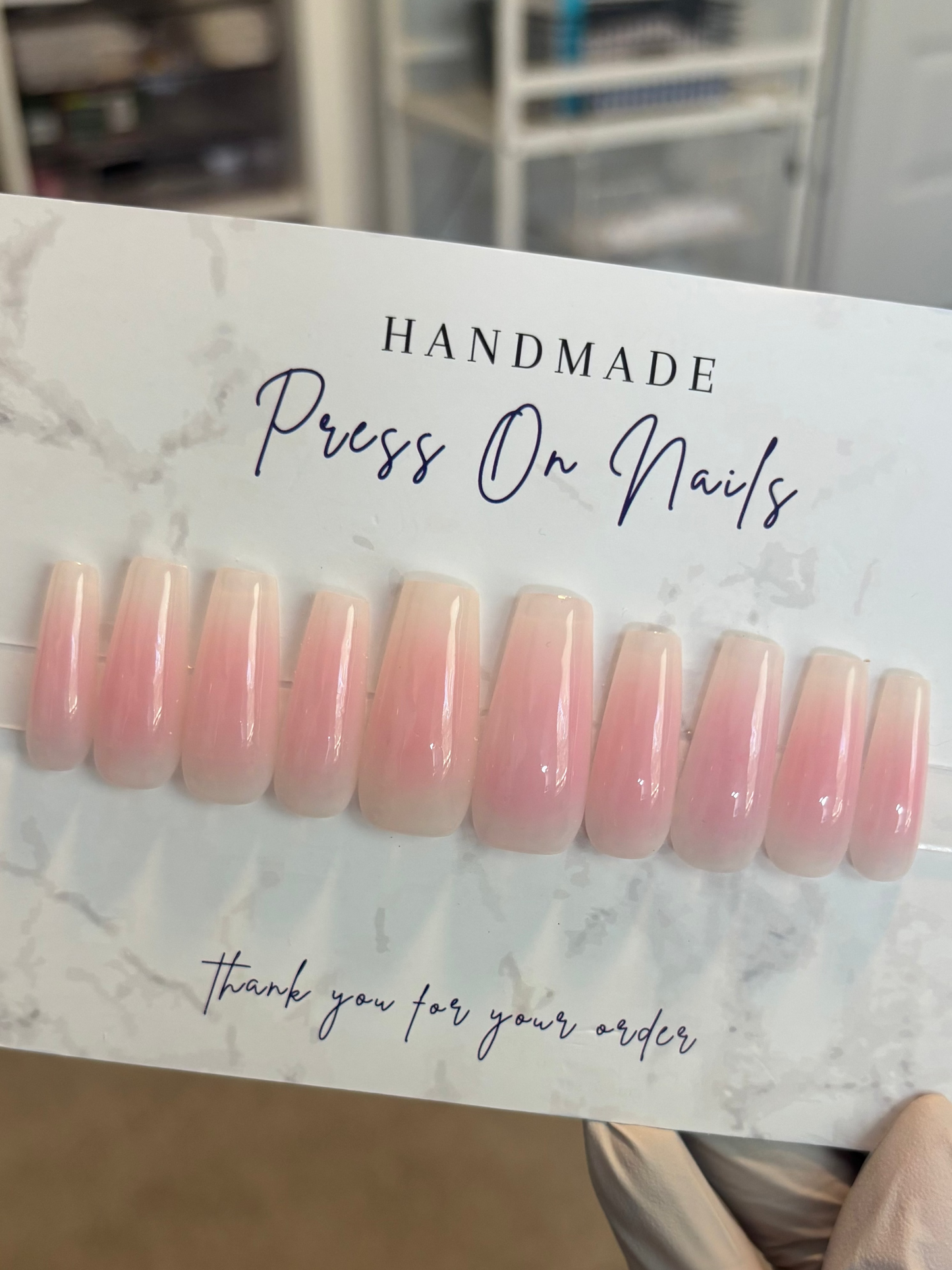Pink and white aura nails